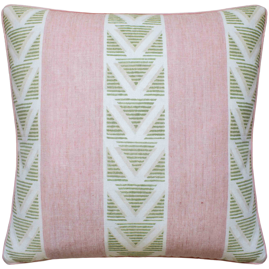 Decorative pillow with pink background and green geometric pattern